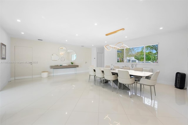 dining space with light tile patterned flooring