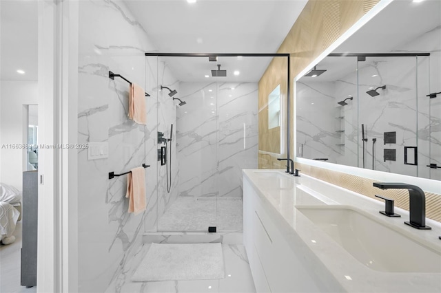 bathroom with an enclosed shower and vanity