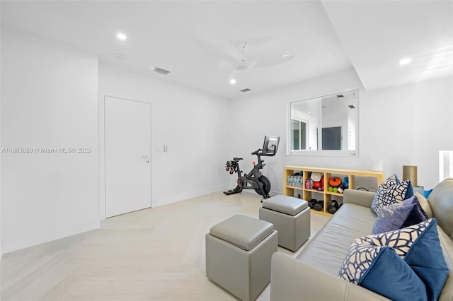 living room featuring ceiling fan and light parquet floors