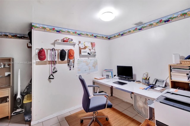 540 NE 142nd St, North Miami, FL 33161 - home office featuring light tile patterned flooring