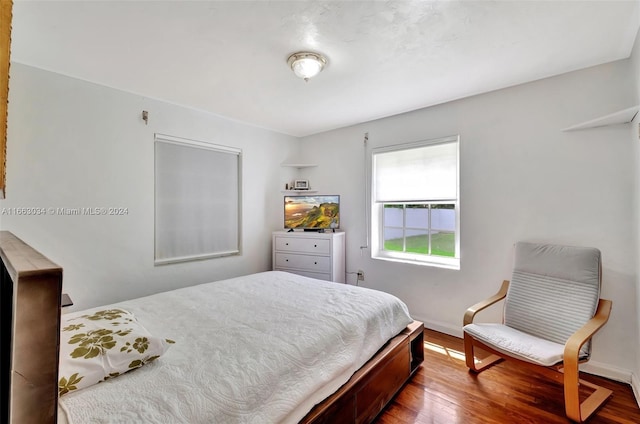 540 NE 142nd St, North Miami, FL 33161 - bedroom with wood finished floors and baseboards
