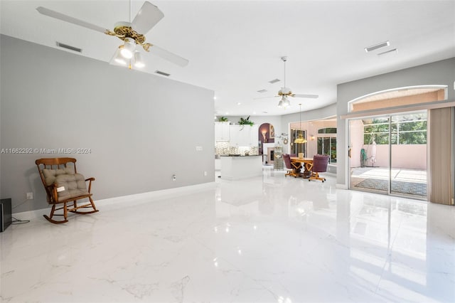 unfurnished room with ceiling fan