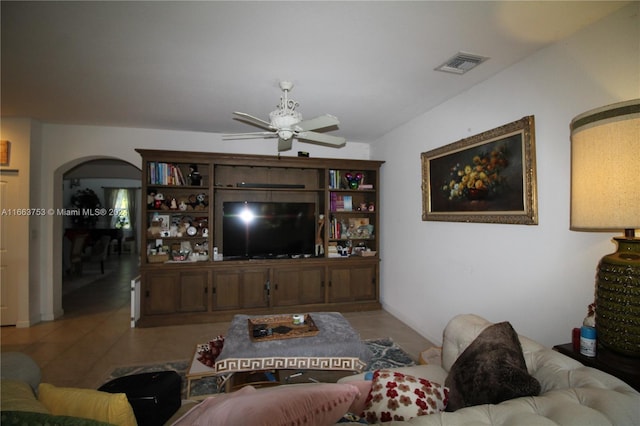 living room with ceiling fan