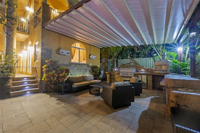 9580 Byron Ave, Surfside, FL 33154 - view of patio / terrace featuring an outdoor kitchen and an outdoor living space