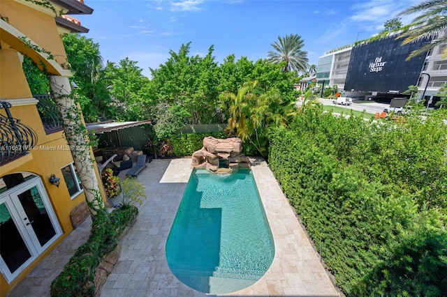 9580 Byron Ave, Surfside, FL 33154 - view of swimming pool with a patio and french doors