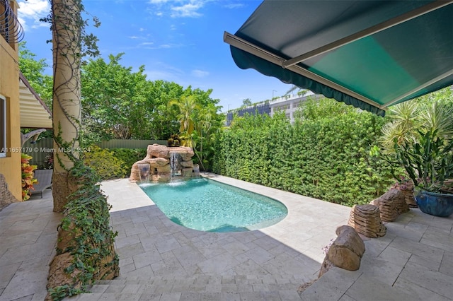 9580 Byron Ave, Surfside, FL 33154 - view of swimming pool with a patio
