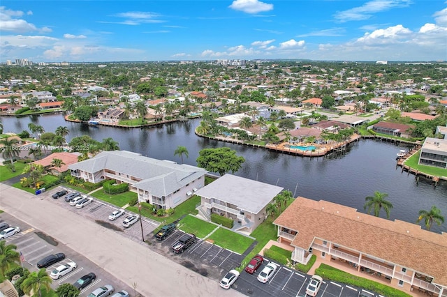 aerial view featuring a water view and a residential view