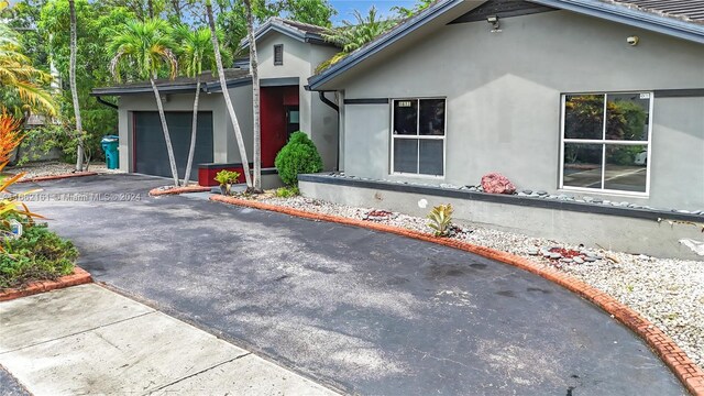 exterior space with a garage