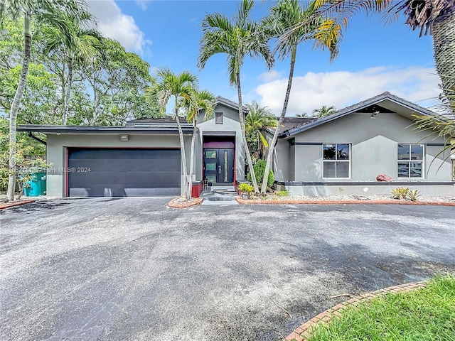 view of front of property with a garage