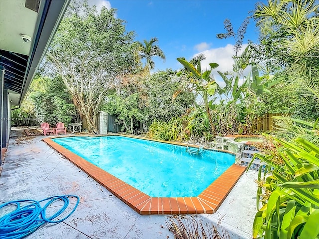 view of pool with a patio