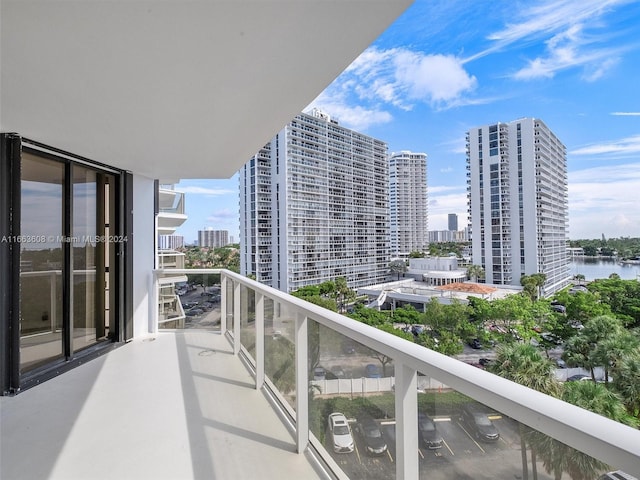 balcony featuring a water view