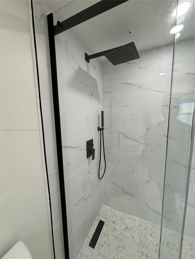 bathroom with an enclosed shower