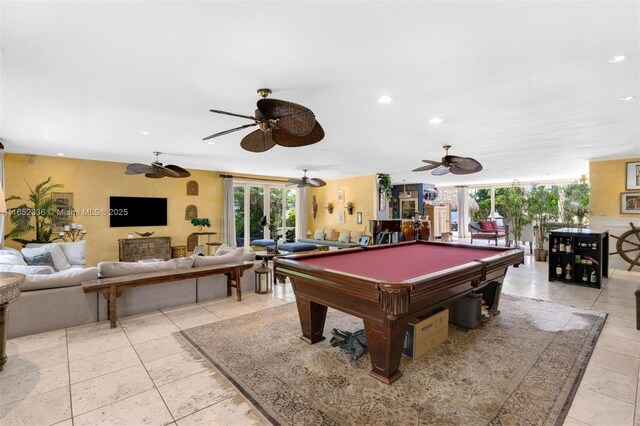 game room with billiards and light tile patterned flooring