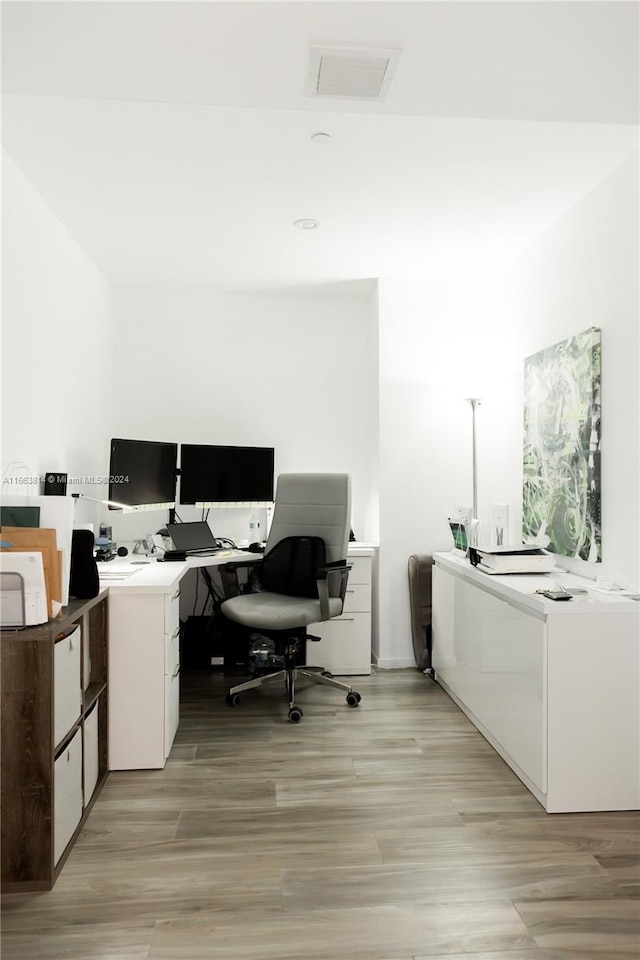 office featuring light hardwood / wood-style floors