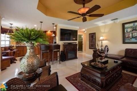 living room with ceiling fan