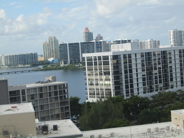 property's view of city featuring a water view