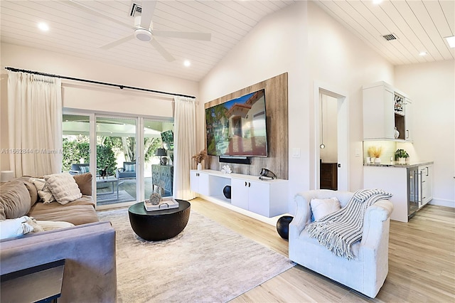 living room with light wood-type flooring, high vaulted ceiling, ceiling fan, and wood ceiling