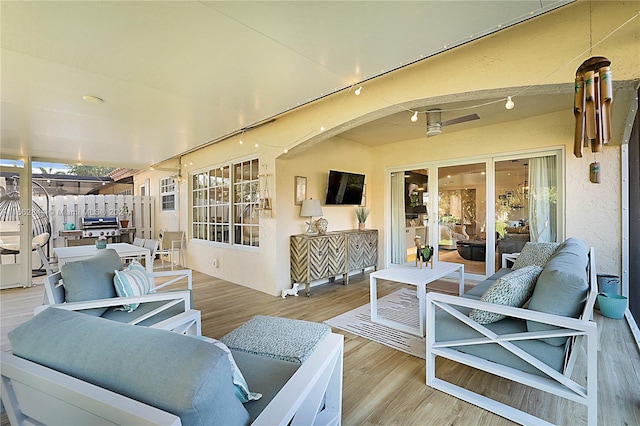 wooden deck with an outdoor hangout area