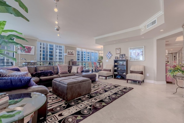 living room featuring crown molding