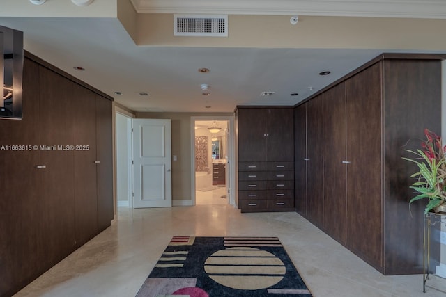 corridor featuring crown molding