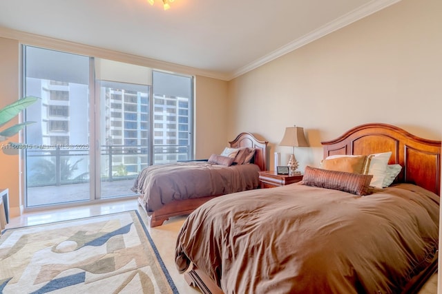 bedroom featuring multiple windows, access to exterior, and ornamental molding