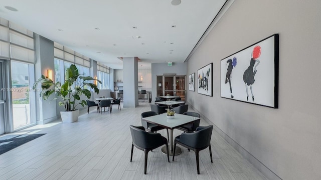 dining area featuring light wood-type flooring