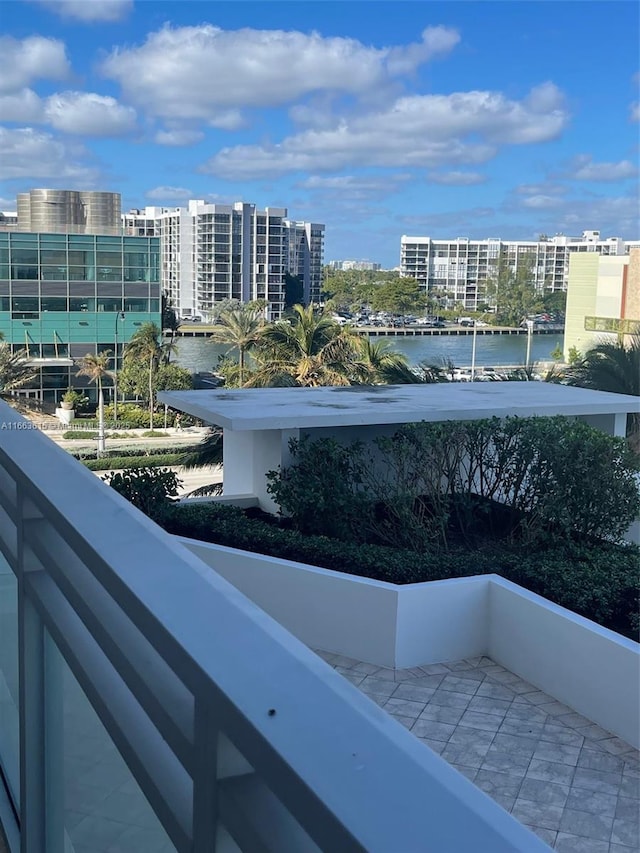 balcony featuring a water view