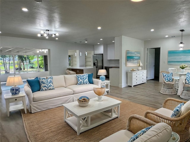 living room with hardwood / wood-style floors