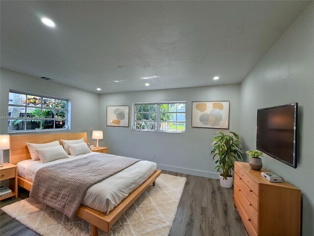 bedroom featuring dark wood-type flooring