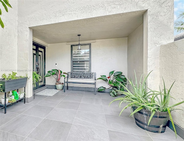 exterior space featuring stucco siding