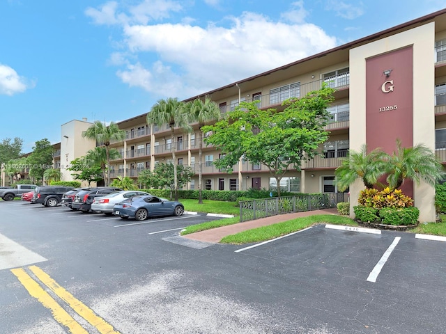 13255 SW 9th Ct Unit 114G, Pembroke Pines, FL 33027 - view of property with uncovered parking