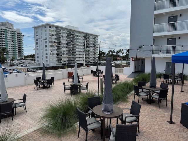 view of patio with a balcony