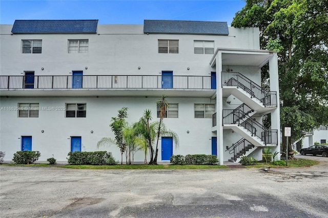 view of building exterior with stairs