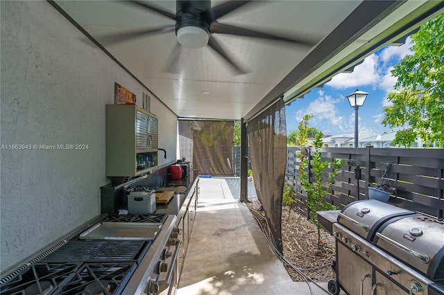 view of patio / terrace featuring ceiling fan and a grill