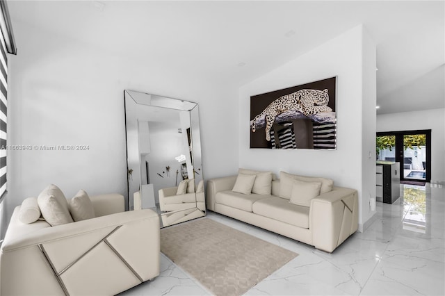 living room with lofted ceiling