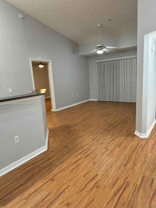 unfurnished room featuring light wood-type flooring and ceiling fan