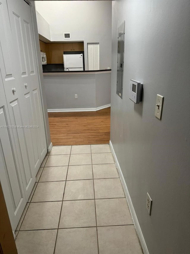 hallway featuring light wood-type flooring