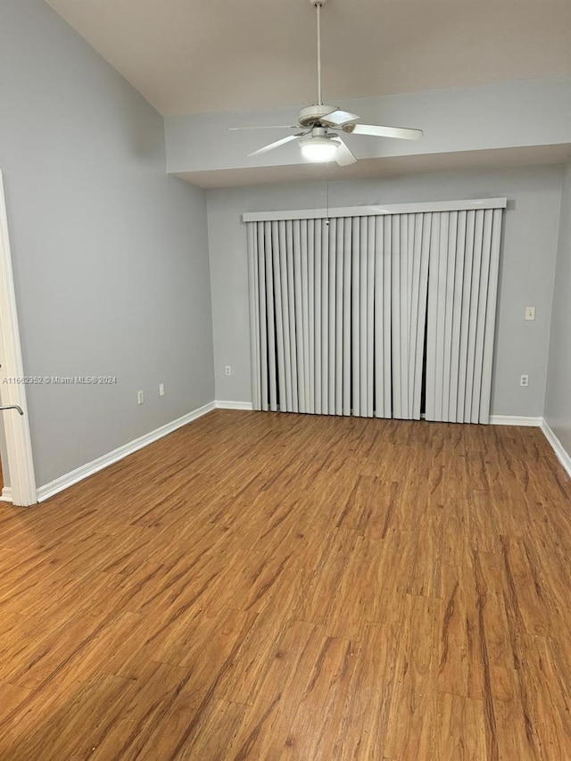 spare room featuring ceiling fan and hardwood / wood-style floors