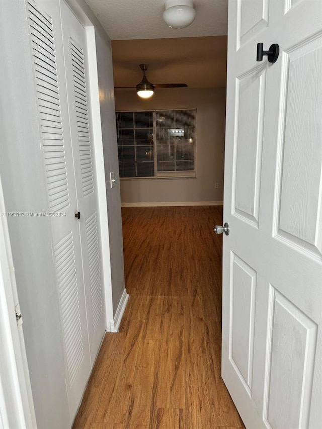 hall featuring hardwood / wood-style flooring