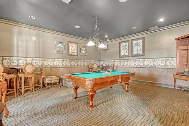 game room featuring pool table, light carpet, indoor bar, wooden walls, and crown molding