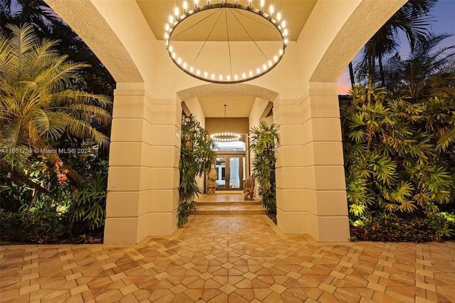 exterior entry at dusk with french doors