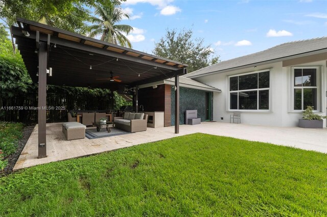 view of pool with a patio and a yard