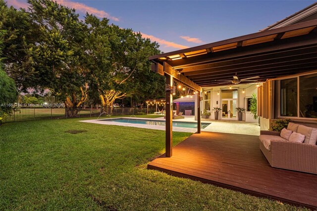 view of patio with outdoor lounge area and a wooden deck