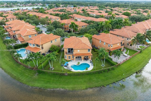 drone / aerial view with a water view