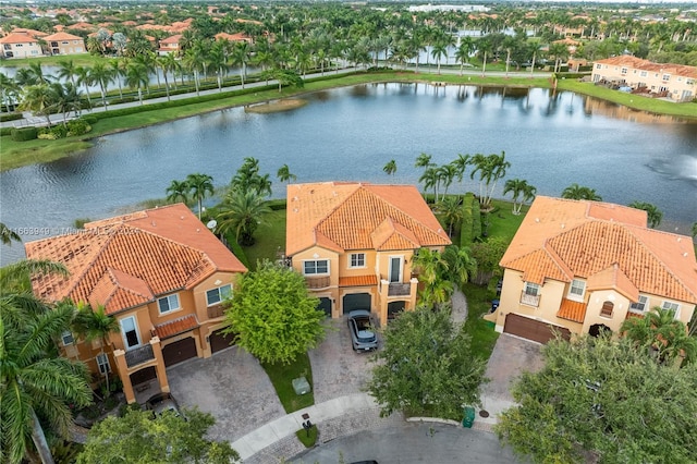 drone / aerial view with a water view