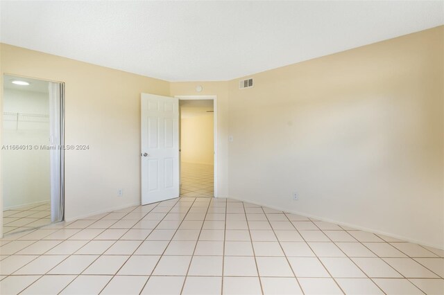 view of tiled spare room