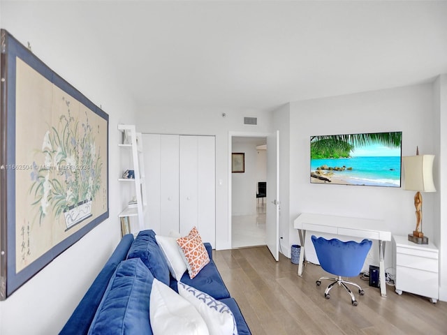 interior space featuring a closet and hardwood / wood-style flooring