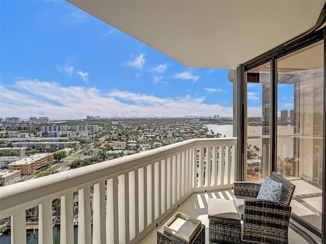 balcony featuring a water view