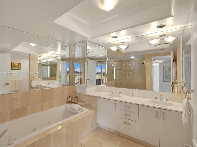 bathroom featuring shower with separate bathtub, tile patterned flooring, and vanity