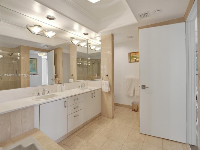 bathroom with vanity, tile patterned flooring, and a shower with door